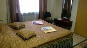 Фото номера Двухместный номер с 2 отдельными кроватями Гостиница Мариинский г. Малышева 4